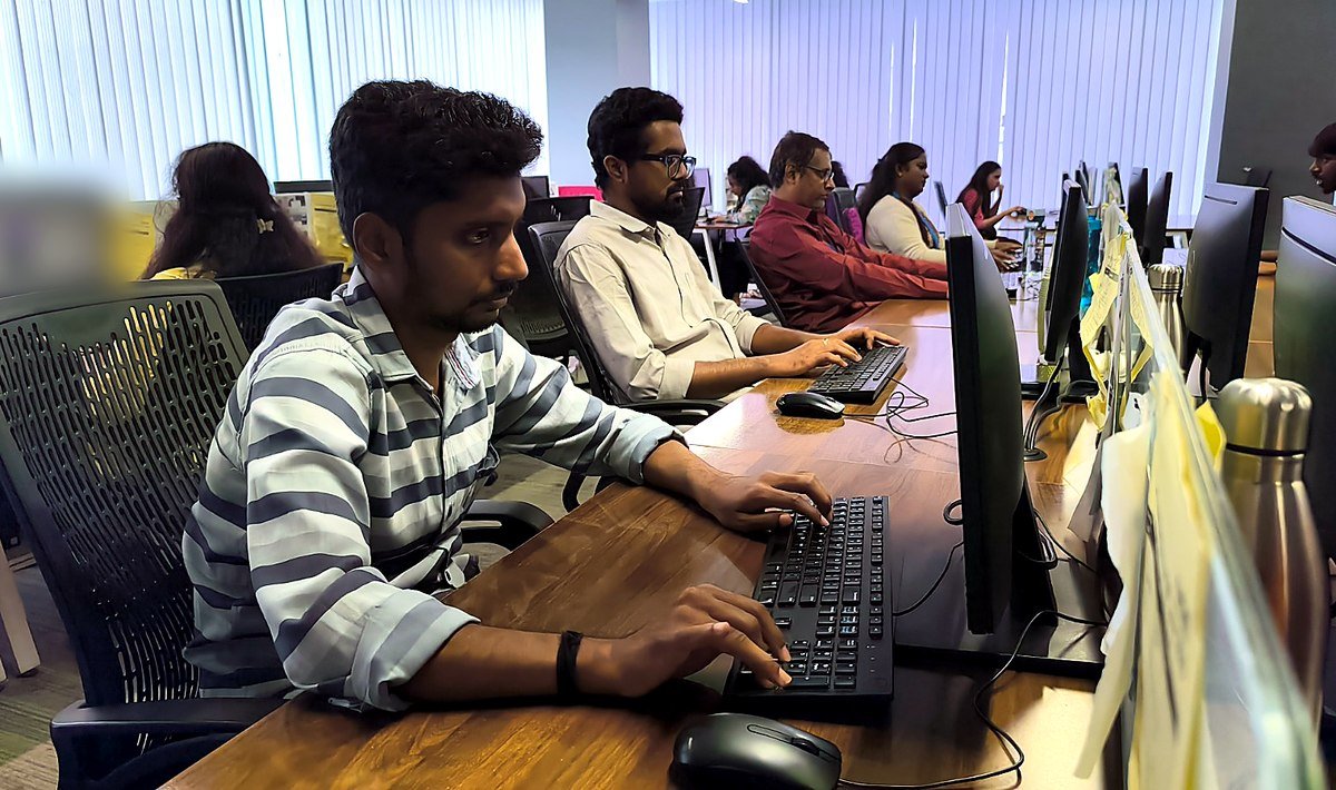 Accutech reviewers at work on the review floor